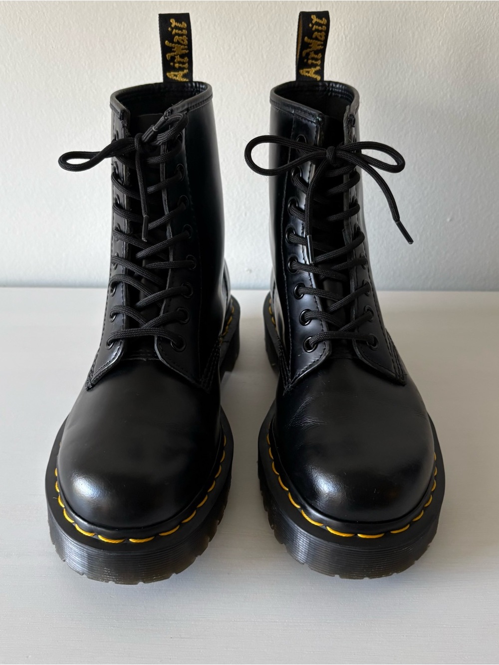 Dr. Martens Black Leather 8-Eye Lace-Up Boots with Yellow Stitching